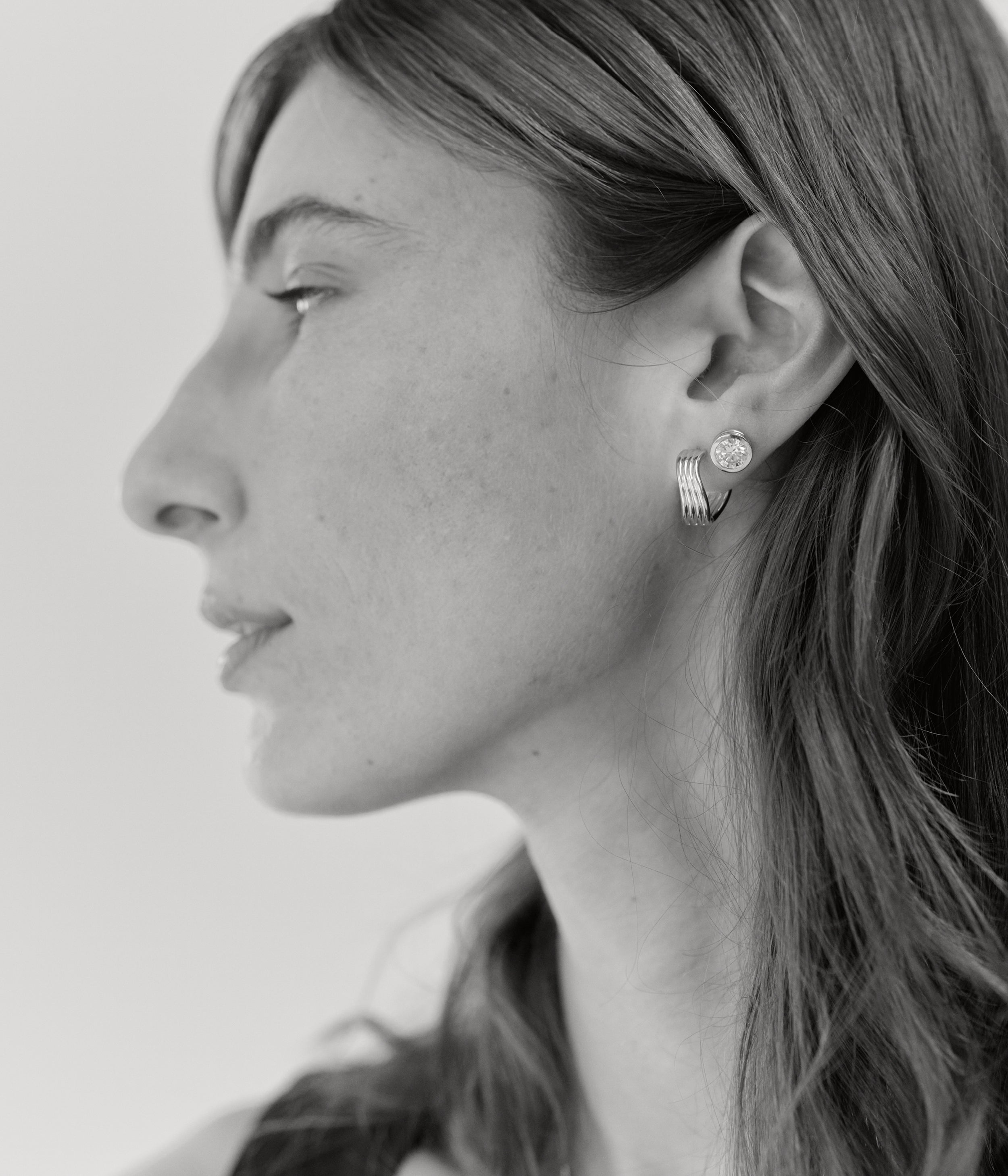 Strata Solitaire Stud Earring, Brilliant Cut Topaz. Silver