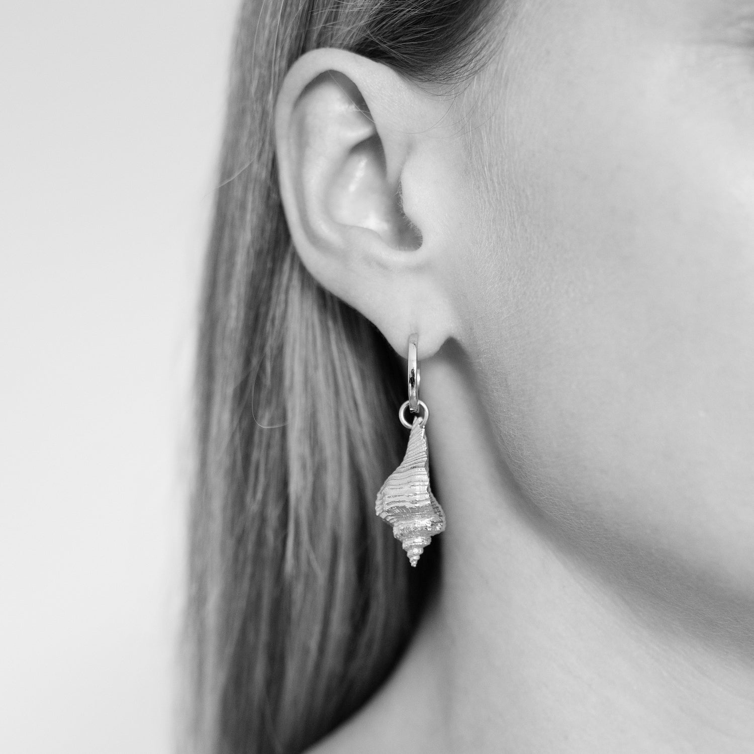 Praesidio Shell Huggie Hoops, Silver. Co-Designer Christina Macpherson