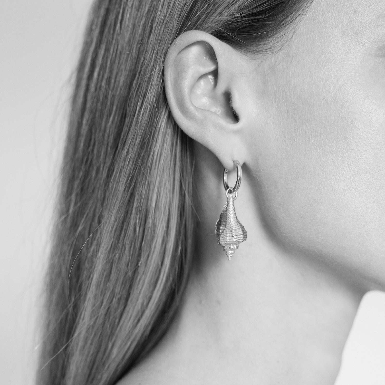 Praesidio Shell Huggie Hoops, Silver. Co-Designer Christina Macpherson